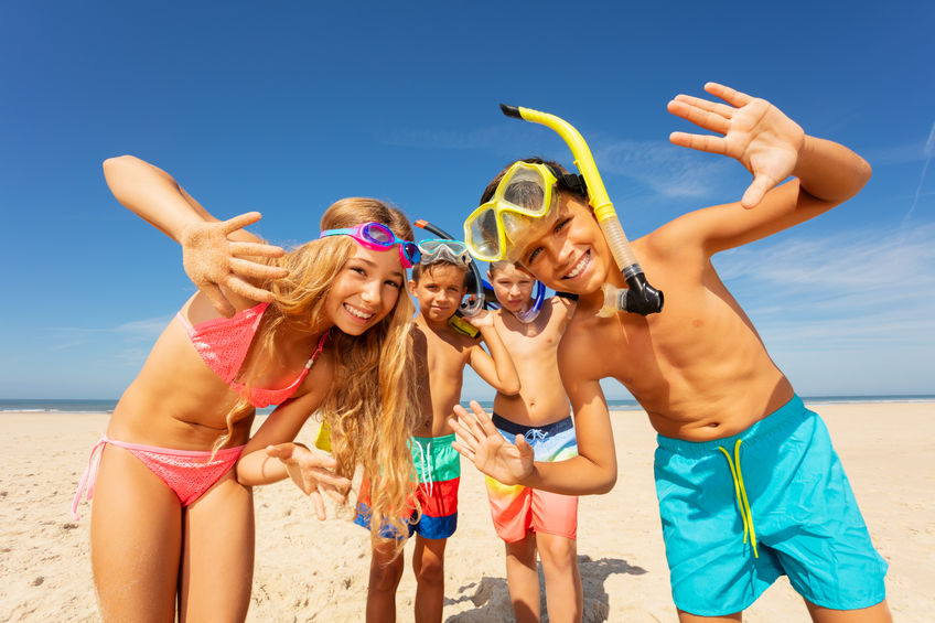 4 kids at beach with snorkel gear